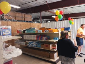 people at opening of a new pantry